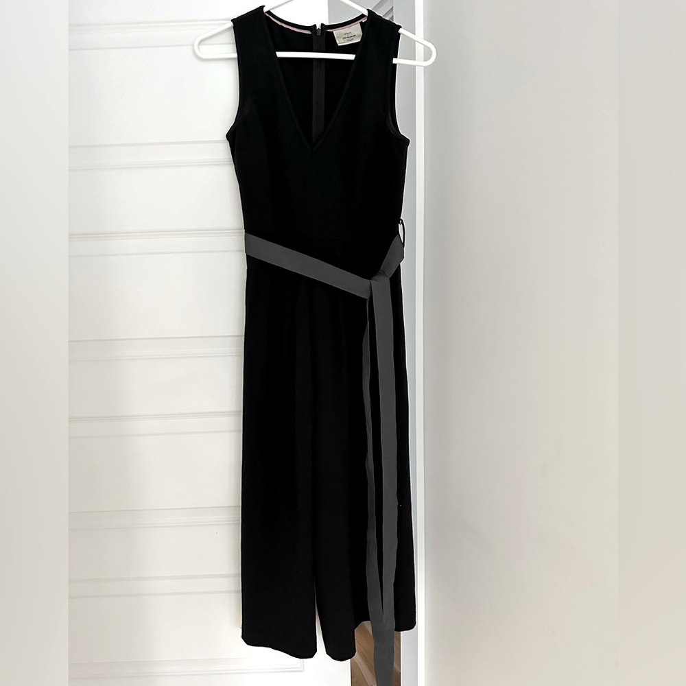 Anthropologie black V-neck wide leg jumpsuit.